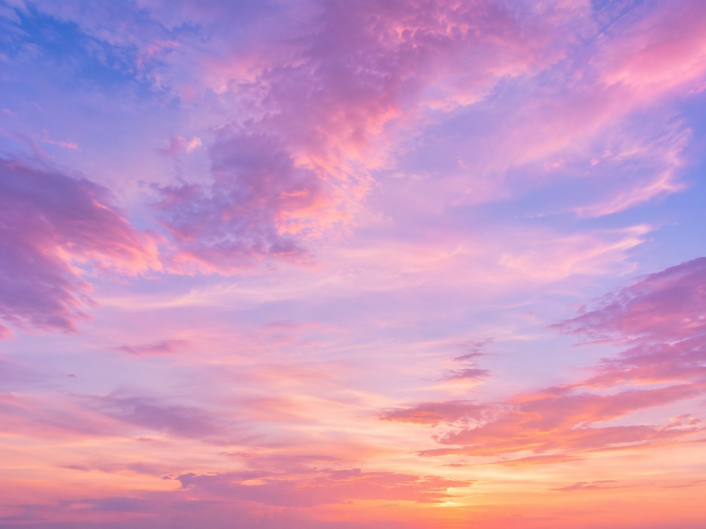 Soft pink and lavender clouds at dawn